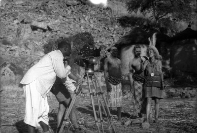 Gadala Gubara ( behind the camera ) with Leni Riefenstahl filming the Nuba